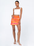   side view of model wearing Princess Polly Amelia Mini Skirt Orange Mini Skirts 