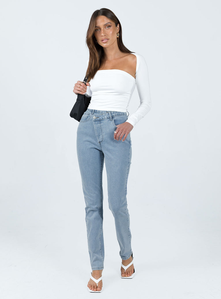 Front view of model wearing  front Princess Polly High Waisted  Darley Asymmetric Jeans Denim