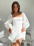 Front view of model wearing  front Princess Polly Square Neck  Barrera Long Sleeve Mini Dress White