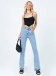 front view of model wearing Princess Polly Nikaia Denim Jeans Mid Rise 