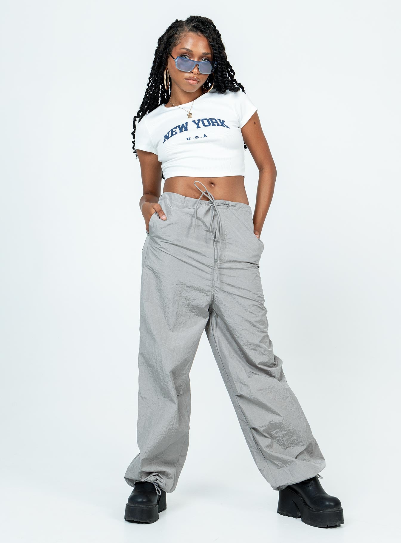 front view of model wearing Princess Polly New York Baby Tee White Short Sleeves Crew Neck 