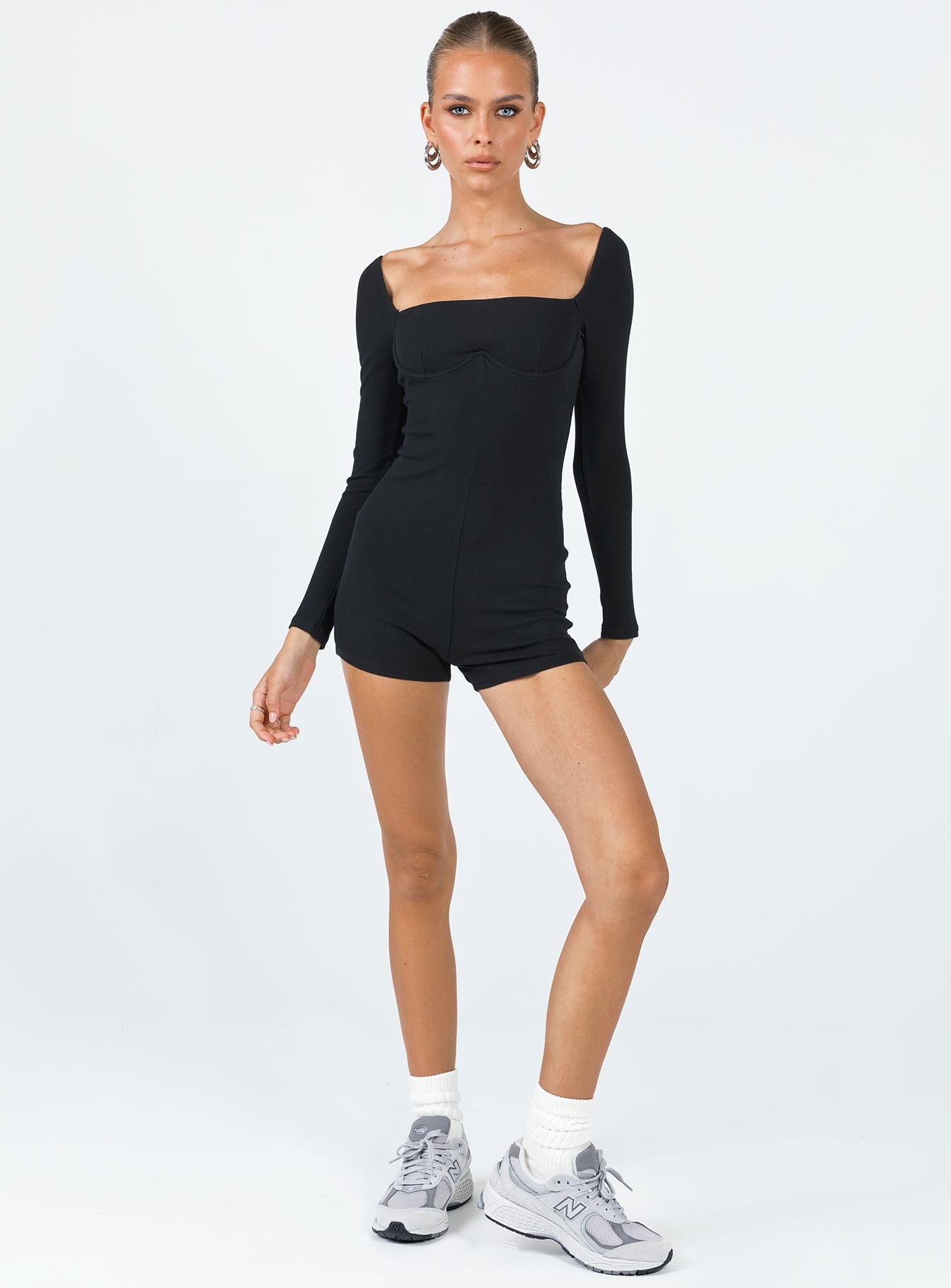 Long sleeve romper Ribbed material Square neckline Wired bust Invisible zip fastening at back Good stretch