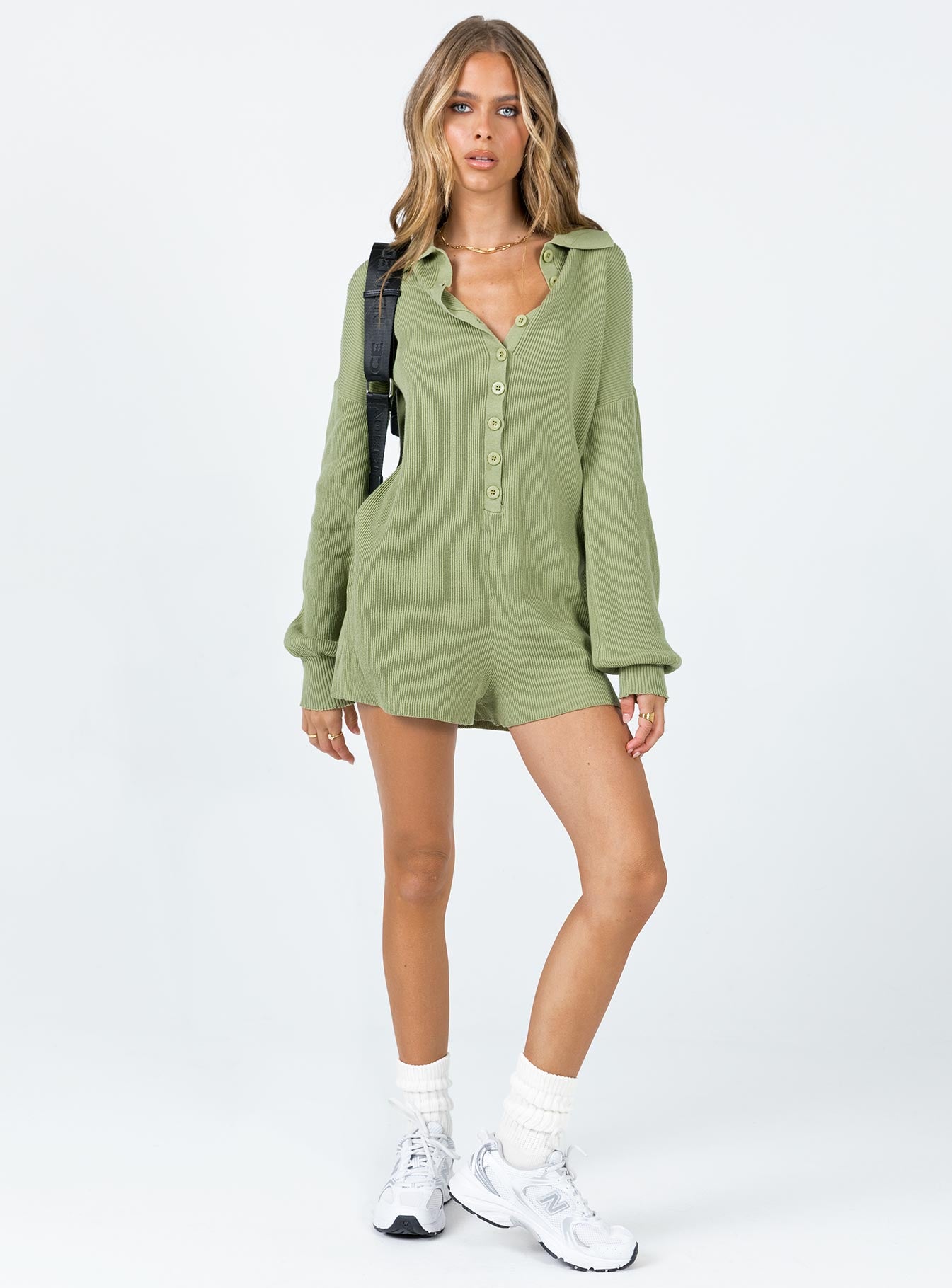 Playsuit Knit material  Classic collar  Button front fastening Drop shoulder  Raw cut hem 