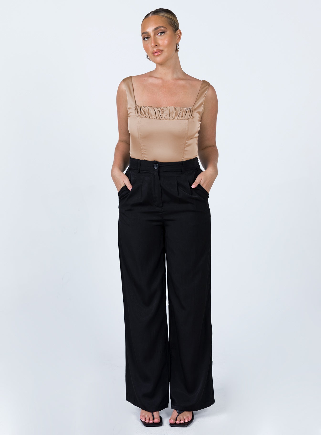 front view of model wearing Princess Polly Ximena Bodysuit Beige Sleeveless Square Neck 