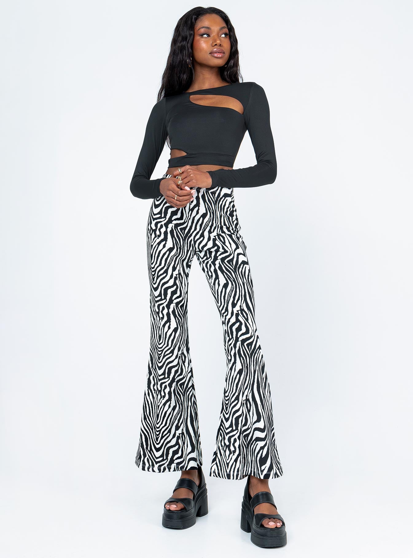 front view of model wearing Princess Polly Jaxson Long Sleeve Top Black 