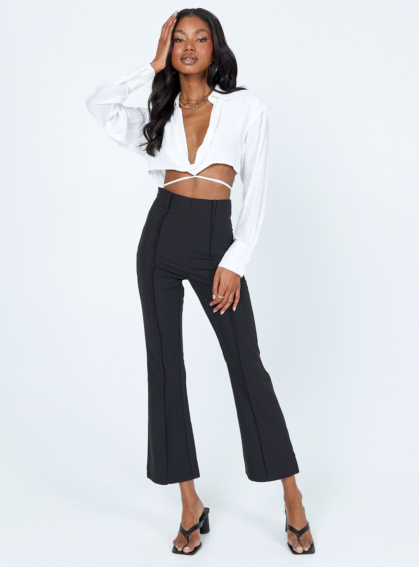 front view of model wearing Princess Polly Caprice Long Sleeve Top White 