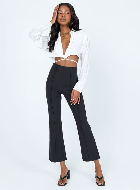 front view of model wearing Princess Polly Caprice Long Sleeve Top White 