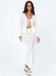 White long sleeve top Crochet material Wide neckline Tie fastening at bust Good stretch
