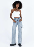 Front view of model wearing  front Princess Polly High Waisted  Johnston Wide Leg Jeans Mid Wash Blue