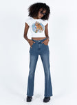 Front view of model wearing  front Princess Polly High Waisted  Carvalho Flare Jeans Mid Wash Denim