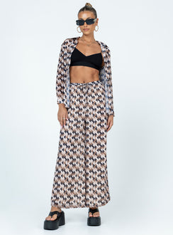 Matching set Sheer material  Geometric print  Button up shirt  High waisted pants  Elasticated drawstring waistband  Wide leg
