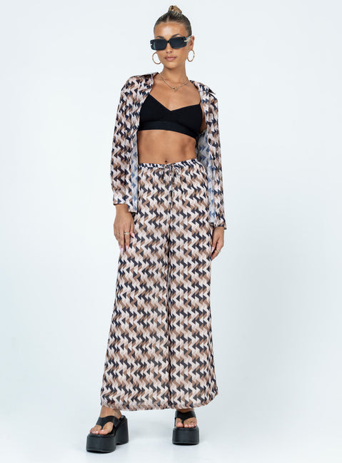 Matching set Sheer material  Geometric print  Button up shirt  High waisted pants  Elasticated drawstring waistband  Wide leg