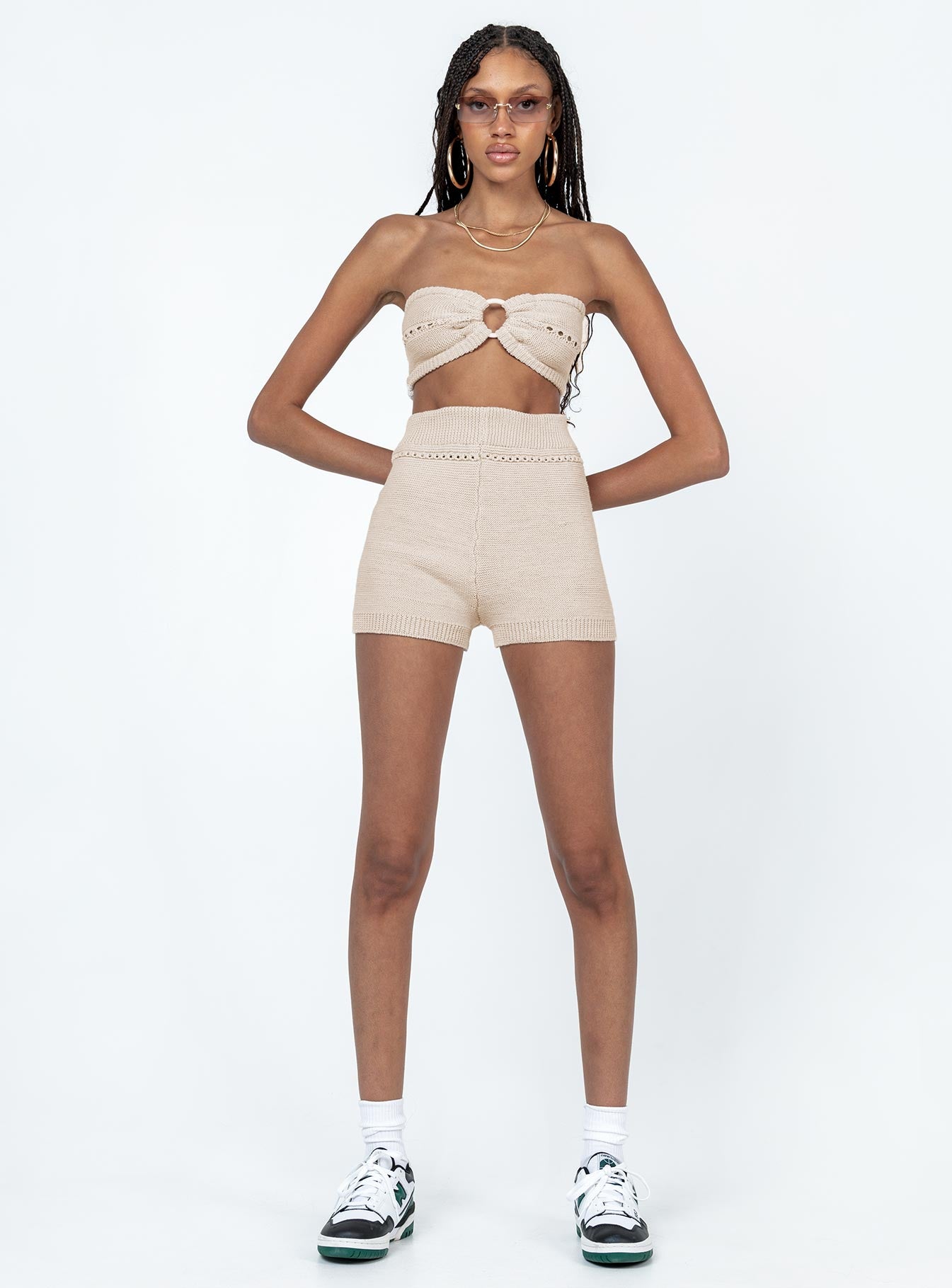 Matching set Soft knit material  Strapless crop top  Ring detail at bust  High waisted shorts  Elasticated waistband  Fitted at leg 