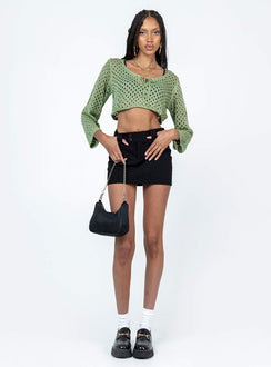 Front view of model wearing  front Princess Polly Short Sleeves Crew Neck  Gardena Top Green