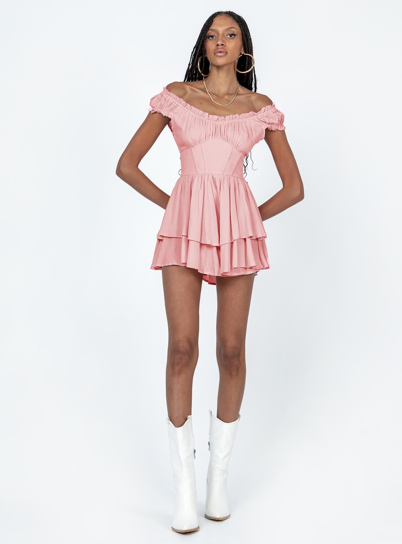 Romper Elasticated shoulders & neckline  Can be worn on or off the shoulder  Gathered bust  Boning through waist  Shirred back panel  Layered bottom 