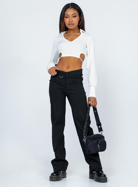 front view of model wearing Princess Polly Corbin Long Sleeve Top White 