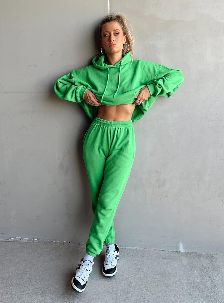 Front view of model wearing  front Princess Polly High Waisted Pants  Renna Track Pants Green