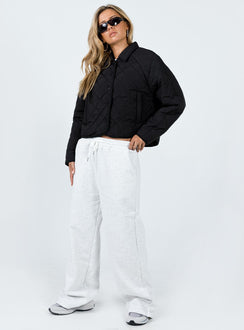 Cropped jacket Quilted material Pointed collar Press button fastening Twin hip pockets Non-stretch