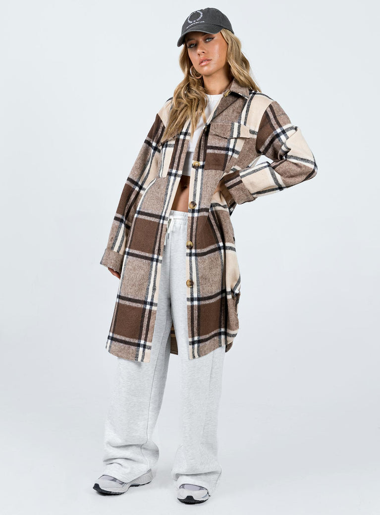 Coat Plaid print Classic collar Button fastening at front Twin chest pockets Single button cuff