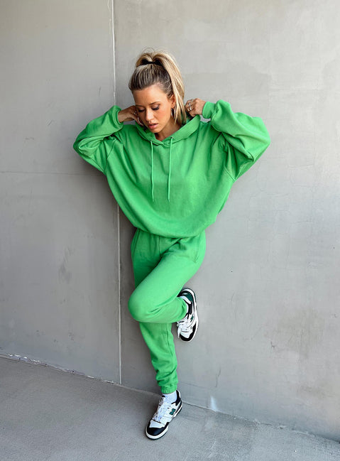 side view of model wearing Princess Polly Ritu Oversized Hoodie Green 
