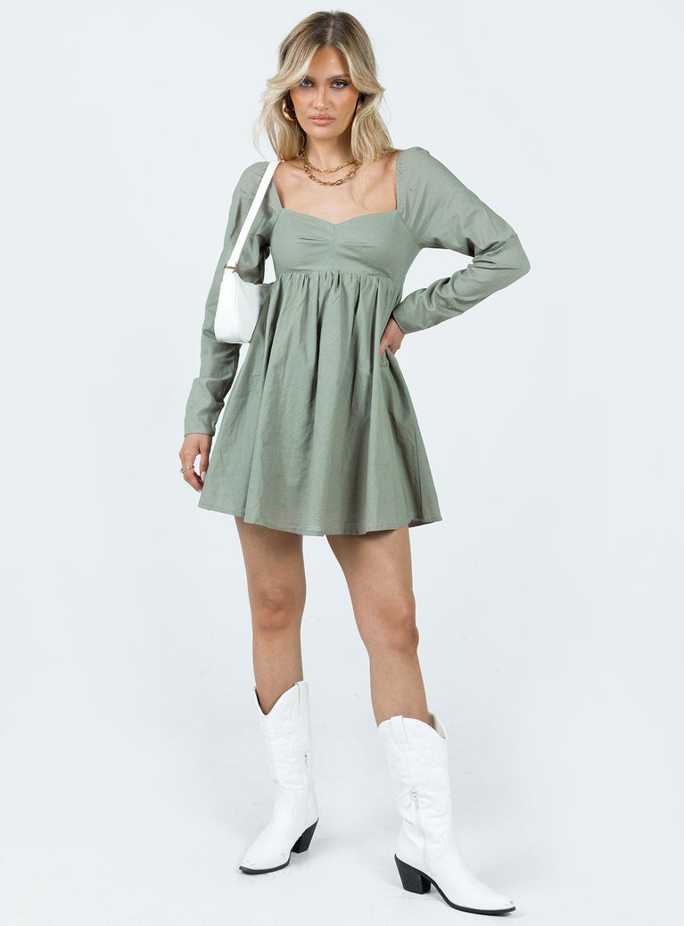 Front view of model wearing  front Princess Polly Crew Neck  Vikki Mini Dress Sage