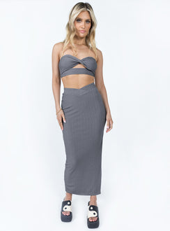 Matching set Ribbed material  Strapless top  Twisted bust  Inner silicone strip  Midi skirt  Elasticated v waistband  High side slit 