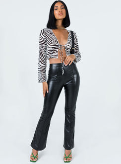 front view of model wearing Princess Polly Daniella Long Sleeve Top Zebra 