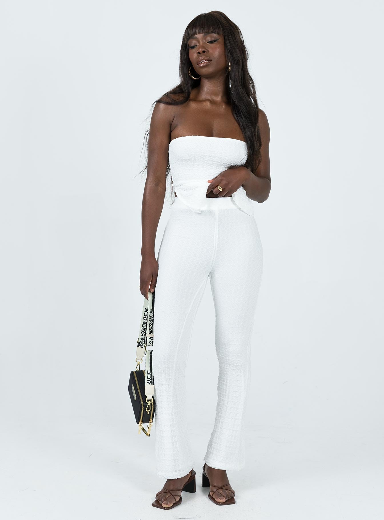 Front view of model wearing  front Princess Polly High Waisted Pants  Vereen Pants White