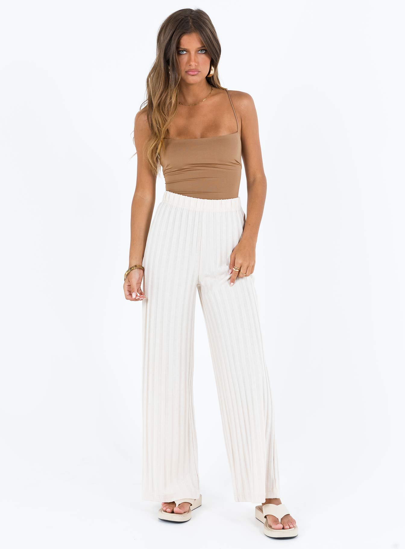 side view of model wearing Princess Polly Karlah Bodysuit Beige Sleeveless Square Neck 