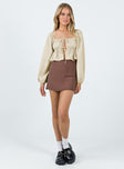 Front view of model wearing  front Princess Polly Full Sleeves Square Neck  Ardelle Top Beige