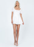 White romper Textured material  Elasticated puff sleeves  Shirred waist  Fixed tie at bust 