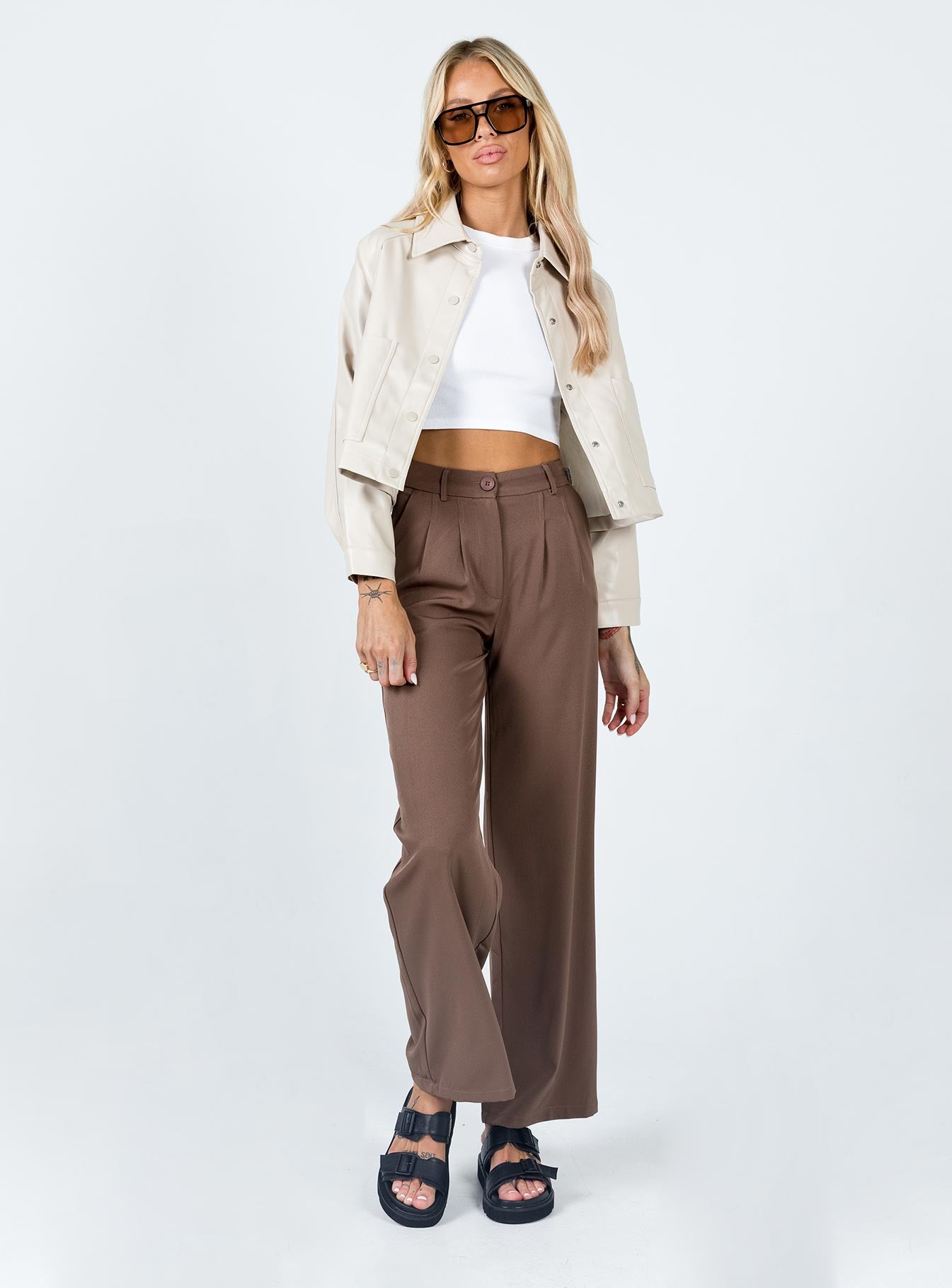 Jacket  Boxy fit  100% PU  Faux leather material  Classic collar  Press button front fastening  Oversized pockets  Single-button cuff 