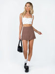 Front view of model wearing  front Princess Polly Sleeveless Square Neck  Elwood Top White