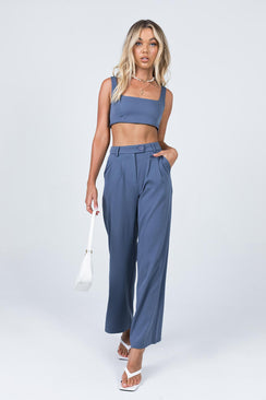 Matching set Crop top Fixed straps Invisible zip fasting at side High waisted pants Wide relaxed leg Belt loops at waist Zip & button fastening