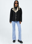 Denim jacket Denim material Faux fur lining Lapel collar Button fastening at front Twin hip pockets Single button cuff