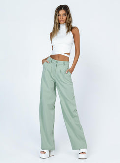side view of model wearing Princess Polly Archer Pants Green 