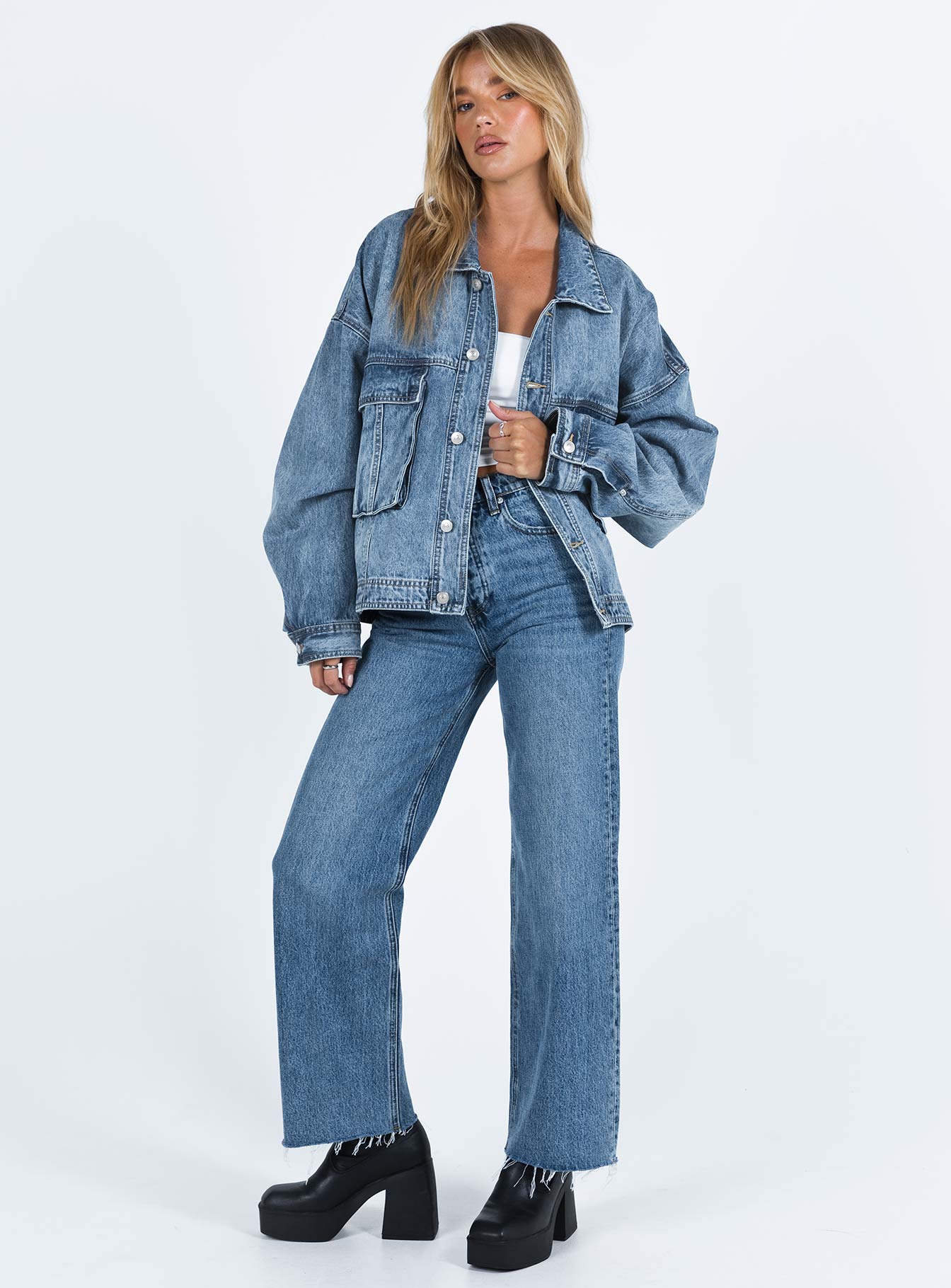 Oversized jacket Mid wash denim Classic collar Drop shoulder Button fastening at front Oversized chest pocket Single button cuff