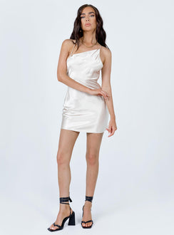 front view of model wearing Princess Polly Ali Draped Asymmetric Mini Dress Champagne 
