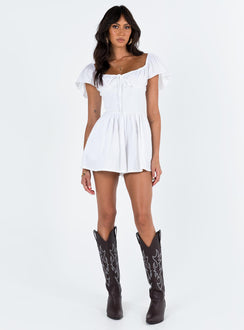 White romper Elasticated shoulders & neckline  Tie at bust  Shirred waist  Twin hip pockets  Fully lined 