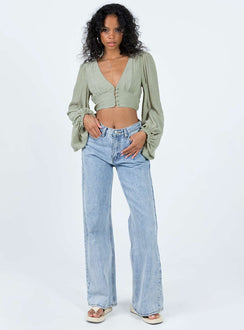 Front view of model wearing  front Princess Polly Full Sleeves Square Neck  Castlereagh Top Green