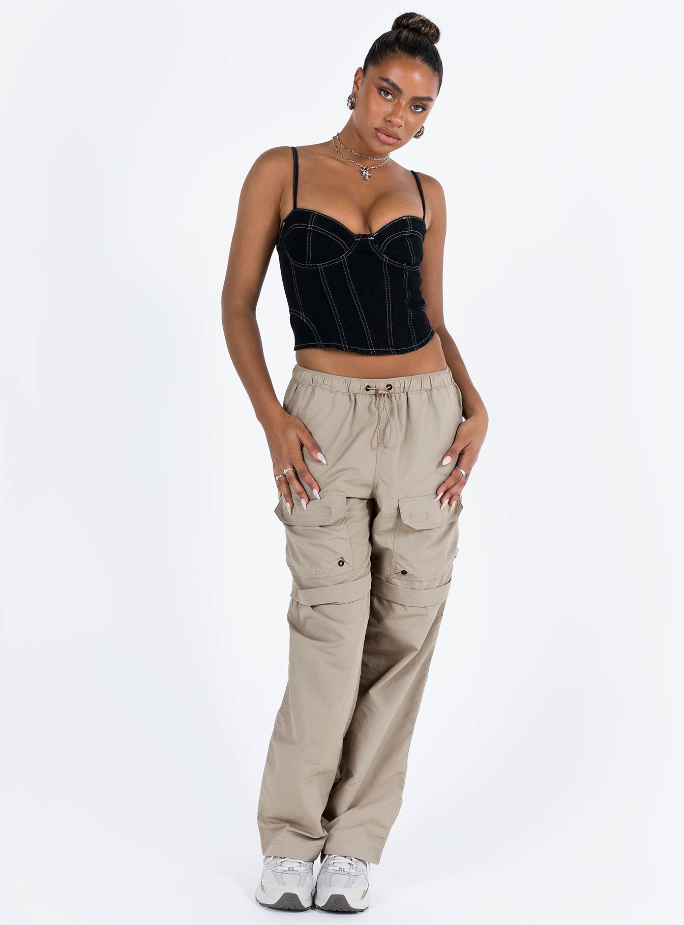 Front view of model wearing  front Princess Polly High Waisted Pants  Stefanni Cargo Pants Beige