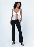 front view of model wearing Princess Polly Yianna Low Waist Flare Pant Black 