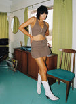 Front view of model wearing  front Bass Drop Mid Rise Mini Skirt Khaki Princess Polly  Mini Skirts 