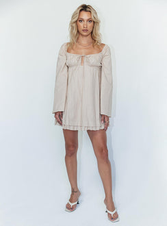 side view of model wearing Princess Polly Empress Of Love Long Sleeve Mini Dress Beige 