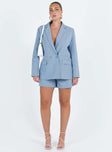 Blue blazer Lapel collar Button fastening at front Shoulder pads Faux hip pockets Split at back