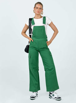 Overalls Cargo style Adjustable shoulder straps  Chest pocket  Button fastening at hips Six leg pockets  Silver-toned hardware  Wide leg  Pleated detail at inner leg