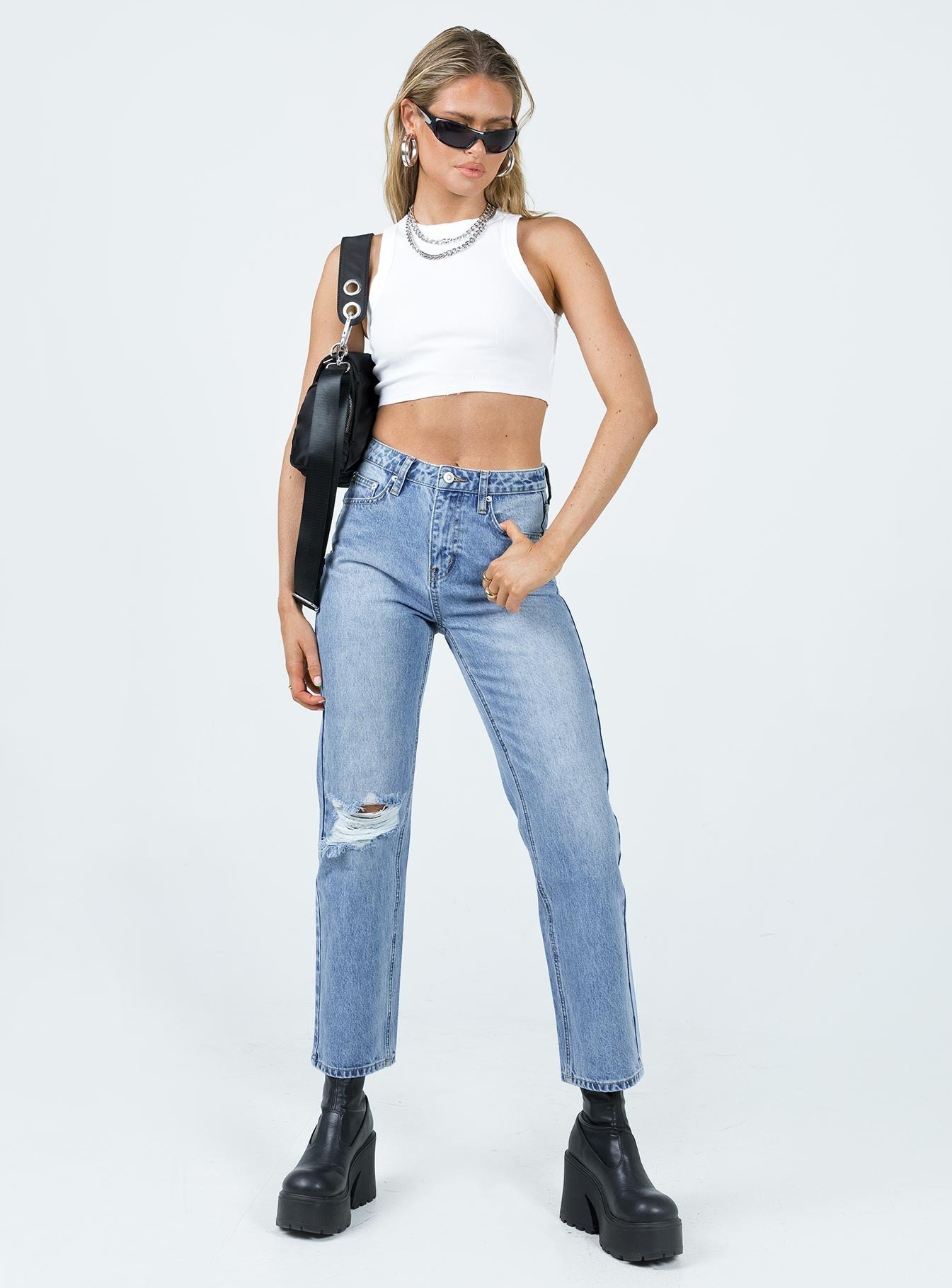 Front view of model wearing  front Princess Polly High Waisted  Calisto Straight Leg Jean Light Wash Denim