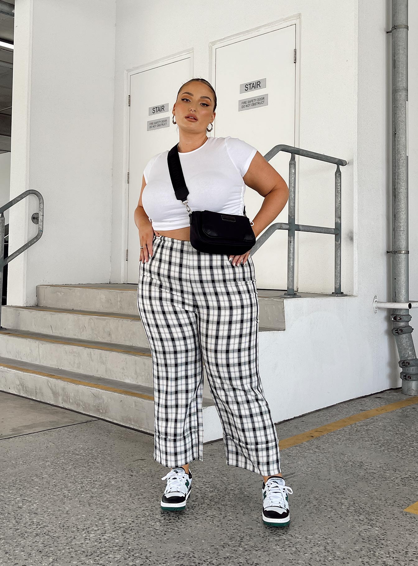 front view of model wearing Princess Polly Evant Tee White Curve 