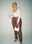 side view of model wearing Princess Polly Love Club Pants Brown Curve 