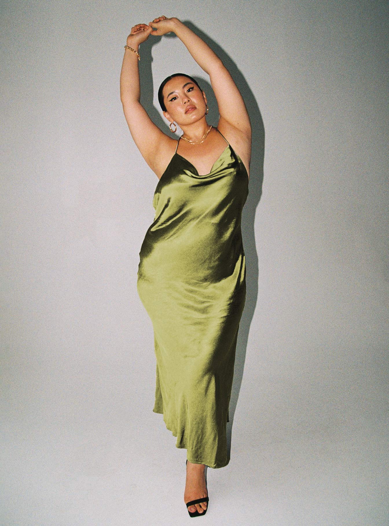 Front view of model wearing  front Princess Polly High Neck  Alissa Maxi Dress Green Curve